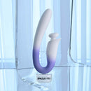 Spring Loaded Rechargeable Silicone Dual Vibrator Purple displayed against a glass backdrop showcasing its elegant design.