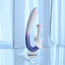 Spring Loaded Rechargeable Silicone Dual Vibrator Purple displayed on a reflective surface, showcasing its sleek design and features.