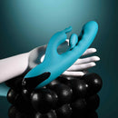 Bunny Tapper Tapping Rabbit Vibrator Blue held in a hand, featuring a unique design with a gently curved vibrating shaft.