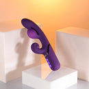 Pleasure Puff Silicone Expandable Rabbit Vibrator Purple displayed on modern pedestals with a soft background.
