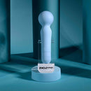 Iris Rechargeable Silicone Wand Blue displayed on a sleek stand, emphasizing its stylish design and color.