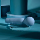 Iris Rechargeable Silicone Wand Blue on a clear stand with blue geometric background, showcasing its body-safe design.