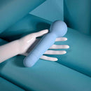 Iris Rechargeable Silicone Wand Blue positioned on a hand, showcasing its sleek design and soft silicone material.