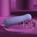 Squishy Bullet Rechargeable Silicone Vibrator Purple on a clear display with a soft exterior and sensual design.