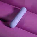 Squishy Bullet Rechargeable Silicone Vibrator Purple on purple background, designed for next-level pleasure and relaxation.