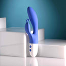 Funny Bunny Rechargeable Silicone Rabbit Vibrator Blue on a white surface with a modern background.