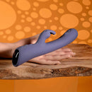 Poppin Good Time Rechargeable Rabbit Vibrator Purple displayed on hand with a stylish design and advanced features
