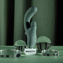 Spiral Charm Rechargeable Clitoral Stimulator Green displayed with clear spheres on a stylish background.