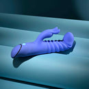 Knock Knock Rechargeable Silicone Rabbit Vibrator Blue on a soft blue surface, showcasing its unique design and texture.