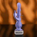 Wiggly Bunny Rechargeable Rabbit Vibrator Purple displayed on a wooden surface with a sleek design and vibrant color.
