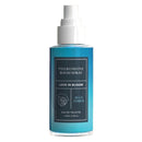 Eye Of Love Bloom Male Pheromone Room Spray Blue Ember in a sleek blue bottle for creating a romantic atmosphere.