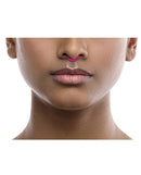 Model showcasing Rave Ring Vapor Eucalyptus Nasal Diffuser Pink on the septum for a refreshing scent experience.