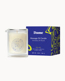 Dame Massage Oil Candle Wild Lust with lime leaves, ambrette, and white peach fragrance in a glass container.