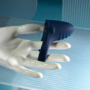 Playboy Pleasure Point Vibrating Penis Ring in navy blue silicone displayed on a white mannequin hand