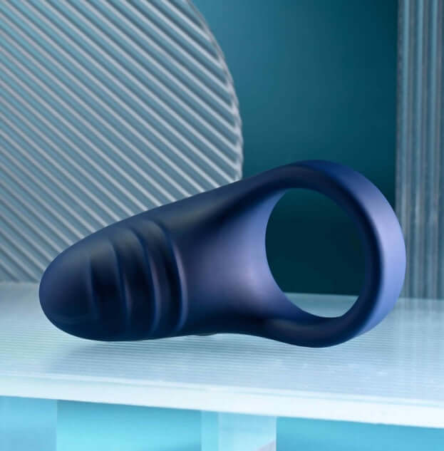 Playboy Pleasure Point Vibrating Penis Ring in body-safe silicone, showcasing a sleek design with a chunky vibrating base for intense pleasure.