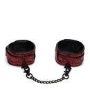 Fifty Shades of Grey Sweet Anticipation Ankle Cuffs in red with chain for comfortable restraint play.