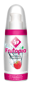 ID Frutopia Natural Red Raspberry Lubricant 3.4 Oz bottle with vibrant raspberry design and water splash effects.