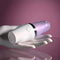 Playboy Getaway Tapping Toy in Lipstick Design | 7 Speeds, Waterproof, USB Rechargeable Displayed on Hand against Pink Background