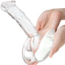 Person holding Gläs 7.5 Inch Rideable Standing Glass Cock with Stability Base, showcasing realistic veiny shaft and weighted base.