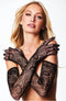 Elegant woman wearing black allover lace opera gloves with a glamorous pose.