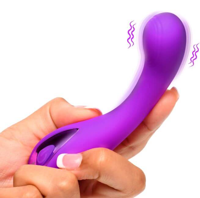 Purple G-Spot Silicone Vibrator with ribbed head for targeted pleasure in hand.