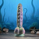 Gender X Monsters Ball Thrusting Vibrating Dildo with Remote Control against an underwater backdrop.