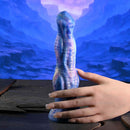 Gender X Wildest Dreams Vibrating Dildo with Remote Control displayed with galaxy-inspired design.