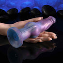 Gender X Imaginary Friend Vibrating Dildo with Remote Control in a hand, showcasing vibrant colors and unique shape.