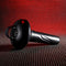 Gender X Echo Vibrator with removable silicone sleeve on textured surface, showcasing sleek design and powerful features.