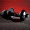 Gender X Echo Vibrator with Silicone Sleeve featuring 10 vibration speeds and waterproof design against a red textured background