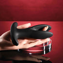Gender X Spread The Love Vibrating Anal Plug with Remote Control Black placed on a hand for display.