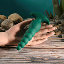 Gender X The Rattler Twirling Prostate Vibrator Green held in hand, showcasing its textured tail-inspired design.