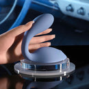 Gender X Shifting Gears Rechargeable Grind Pad Vibrator Blue on display with a hand, showcasing its unique design and features.