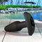 Gender X Team Work dual vibrating remote-control toy with rotating beads on a tropical outdoor setting.