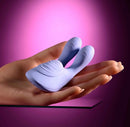 Selopa Handsy Rechargeable Vibrator Purple resting in a palm, showcasing its innovative design and flexible features.