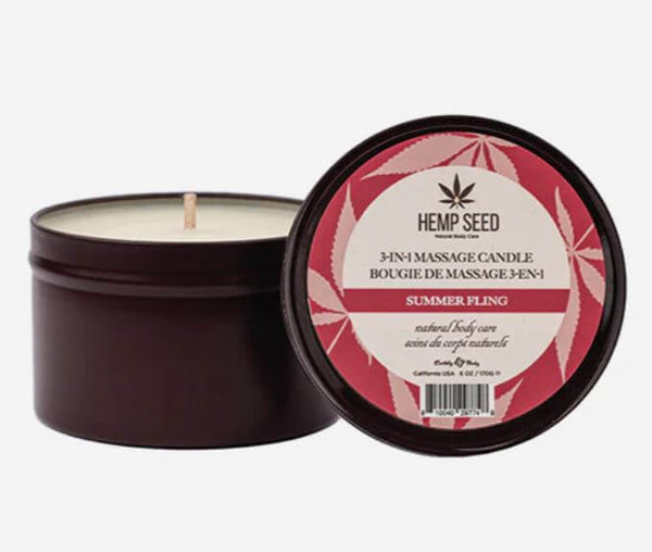 Hemp Seed 3 in 1 Massage Candle Summer Fling 6 Oz in a tin container with a pink and black label.