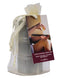 Earthly Body Valentine Candle Trio Bag with massage candles in organza, featuring Crack the Whip, Stiletto, Bottom's Up fragrances.