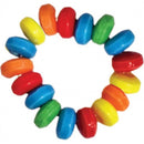 Colorful candy cock ring display with vibrant blue, red, green, orange, and yellow pieces for adult fun.