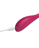 Puff App-Controlled Inflatable Kegel Ball Dark Red with charging cable and buttons for smart pelvic floor training.