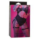 Euphoria Collection Thigh Harness with Chains by CALEXOTICS in black packaging, featuring model wearing vegan leather harness.