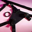 Gender X Pleasure Harness - Fully Adjustable Faux-Leather Strap-On with secure waist and leg straps for a custom fit in black.