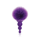 The 9s Cottontails Bunny Tail Butt Plug Beaded Purple featuring a vibrant faux fur bunny tail and smooth graduated beaded design.