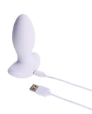 Paradise Illumination THE Plug Vibrator in white with USB charging cable for enhanced pleasure.