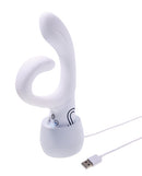 Paradise Illumination THE Rabbit Vibrator charging on a base, showcasing its elegant design and innovative features.