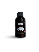 Rhino 10K Male Enhancement Shot in black bottle, 2 oz, offering potent, lasting performance.