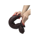 Get Lucky Real Skin 11 Inch Dual Layer Dildo Dark Brown held in hands for demonstration of flexibility and realism.