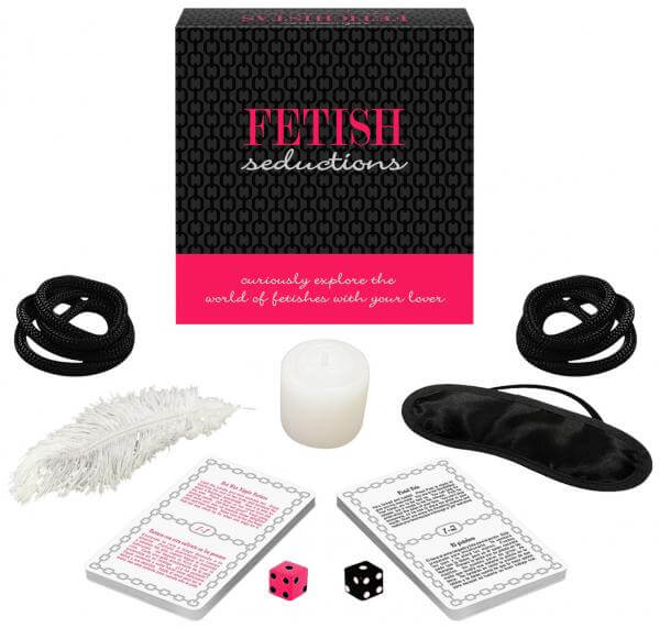 Fetish Seductions Romantic Adult Game set with dice, cards, ropes, candle, feather, and eye mask for exploring fetishes.