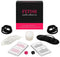Fetish Seductions Romantic Adult Game set with dice, cards, ropes, candle, feather, and eye mask for exploring fetishes.