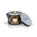 Kama Sutra Massage Candle Vanilla Sandalwood 6 Oz with burning wick and decorative packaging.