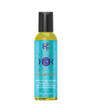 Kama Sutra Celestial Solstice Pheromone Massage Oil 2 Oz in a vibrant bottle with celestial design.
